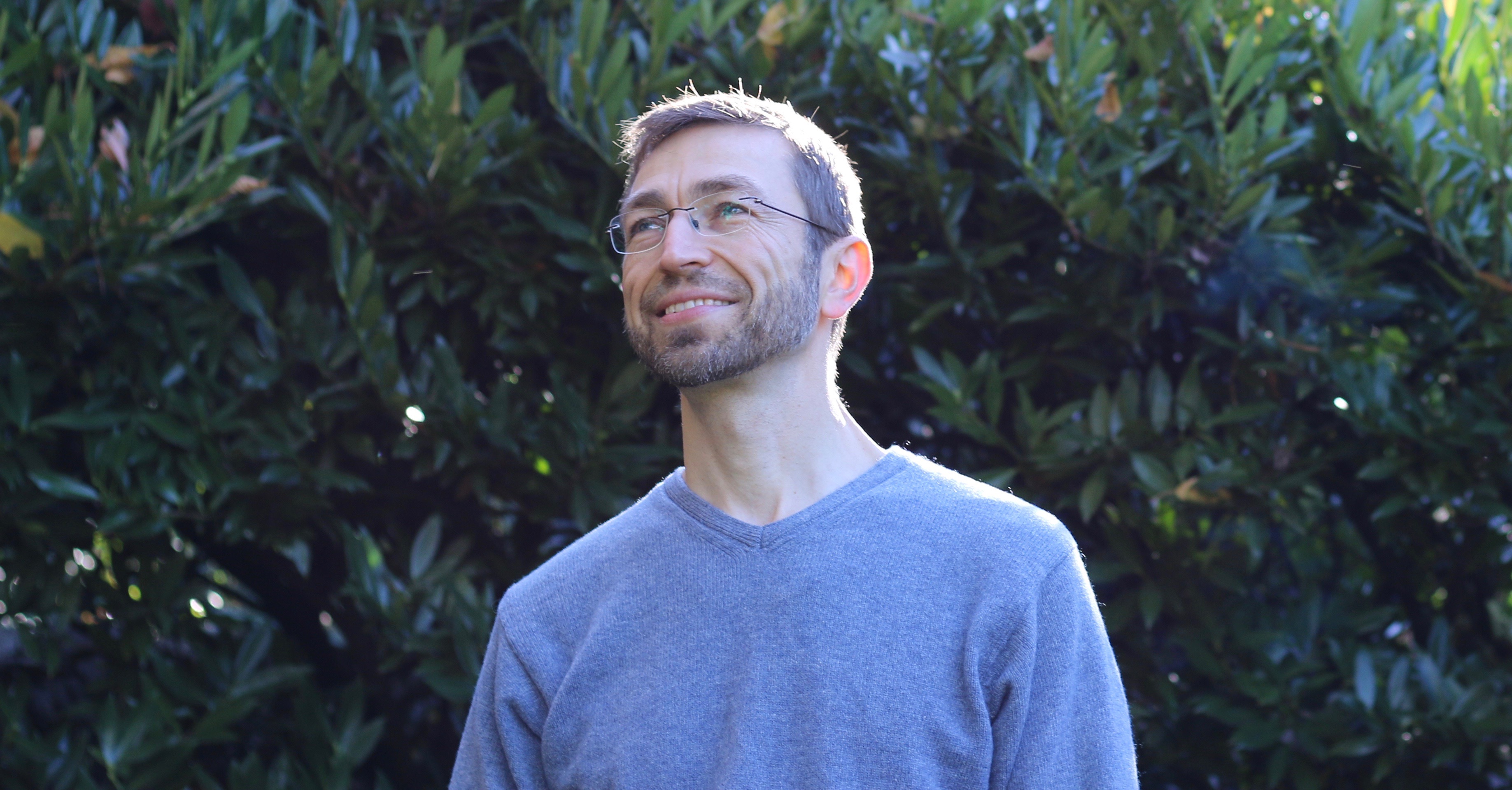Dr. Igor Schwartzman, naturopathic physician, in a Pacific Northwest forest